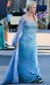 Queen Elsa as she is casually strolling around castle grounds.